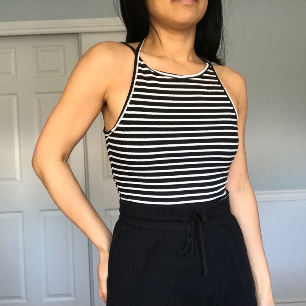 Acemi blue/white striped bodysuit with snap closure; women’s size small.